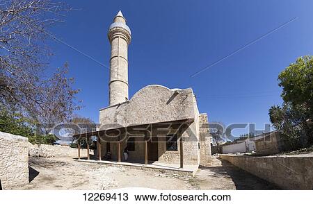 Building with tower against a blue sky; Nicosia, Cyprus View Large Photo Image Stock Image - Building with tower against a blue sky; Nicosia, Cyprus. Fotosearch