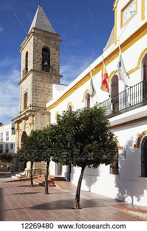 Stock Image - Buildings and bell tower; Conil de la Frontera, Andalusia, Spain. Fotosearch