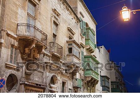 Picture - Buildings With Enclosed Balconies At Night, Valletta, Malta. Fotosearch