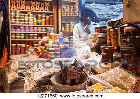 Stock Image - Burning incense, Mutrah souq; Muscat, Oman. Fotosearch
