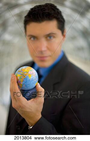 Business Man Holding The World In His Hand View Large Photo Image Picture - Business Man Holding The World In His Hand. Fotosearch