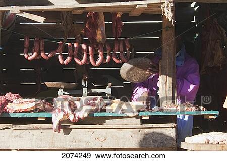 Stock Photo - Butcher In Ranohira, Fianarantsoa Province, Madagascar. Fotosearch