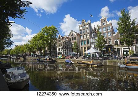 Stock Image - Canal scene; Amsterdam, Holland. Fotosearch