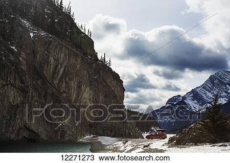 Car parked by lake in Spray Valley Provincial Park; Alberta, Canada View Large Photo Image Stock Image - Car parked by lake in Spray Valley Provincial Park; Alberta, Canada. Fotosearch