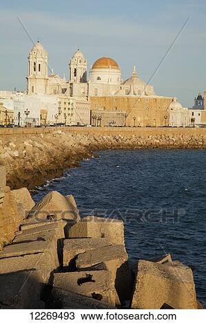 Cathedral and rugged waterfront; Cadiz, Andalusia, Spain View Large Photo Image Stock Image - Cathedral and rugged waterfront; Cadiz, Andalusia, Spain. Fotosearch
