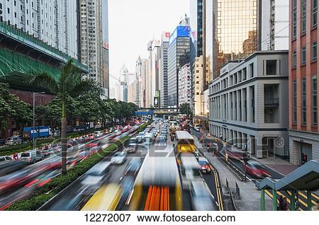 Central district in Hong Kong Island, traffic at dusk; Hong Kong, China View Large Photo Image Stock Photo - Central district in Hong Kong Island, traffic at dusk; Hong Kong, China. Fotosearch