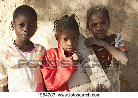 Children standing against the wall at Djenne, Mali View Large Photo Image Stock Photo - Children standing against the wall at Djenne, Mali. Fotosearch
