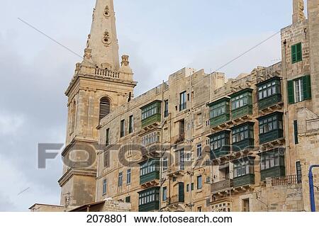 Church And Buildings With Enclosed Balconies, Valletta, Malta View Large Photo Image Stock Image - Church And Buildings With Enclosed Balconies, Valletta, Malta. Fotosearch