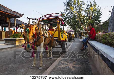 Cidomo, a horse-drawn carriage, Gili Trawangan, West Nusa Tenggara, Indonesia View Large Photo Image Stock Photo - Cidomo, a horse-drawn carriage, Gili Trawangan, West Nusa Tenggara, Indonesia. Fotosearch