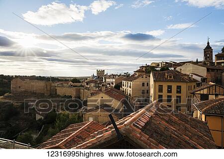 Stock Photograph - Cityscape of Segovia, city walls and houses; Segovia, Castilla Leon, Spain. Fotosearch