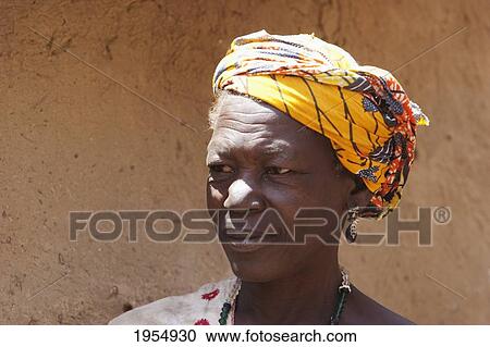 Close-up of a Dogon woman wearing turban in Neni, Mali View Large Photo Image Stock Image - Close-up of a Dogon woman wearing turban in Neni, Mali. Fotosearch