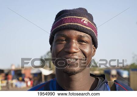 Stock Image - Close-up of a young man in Bamako, Mali. Fotosearch