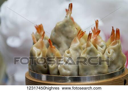 Close up of shrimp filled dumplings; Seoul, South Korea View Large Photo Image Stock Photograph - Close up of shrimp filled dumplings; Seoul, South Korea. Fotosearch