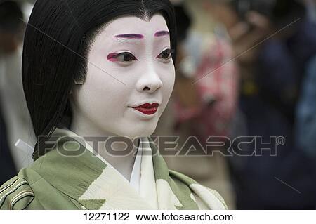 Close up portrait of a Japanese woman in kimono and parade makeup; Kyoto, Japan View Large Photo Image Stock Image - Close up portrait of a Japanese woman in kimono and parade makeup; Kyoto, Japan. Fotosearch