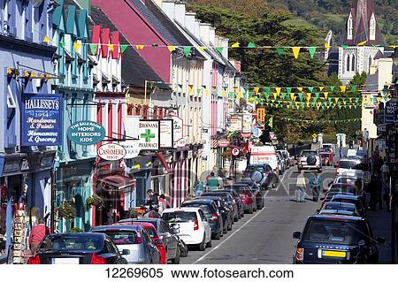 Colourful buildings and the street lined with parked cars; Kenmare, County Kerry, Ireland View Large Photo Image Stock Photography - Colourful buildings and the street lined with parked cars; Kenmare, County Kerry, Ireland. Fotosearch