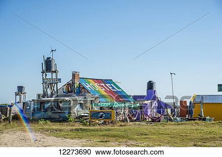 Stock Image - Colourful hostel along the coast; Cabo Polonio, Uruguay. Fotosearch