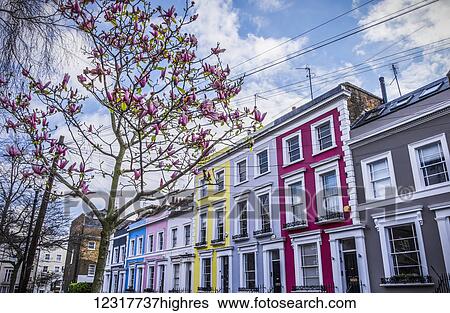 Stock Photograph - Colourful row housing near Portobello Road; London, England. Fotosearch
