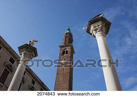 Stock Image - Columns In Piazza Dei Signori And Bissara Tower, Vicenza, Italy. Fotosearch
