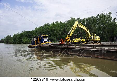 Construction tug pushes barge on canal; Rochester, New York, United States of America View Large Photo Image Stock Photograph - Construction tug pushes barge on canal; Rochester, New York, United States of America. Fotosearch