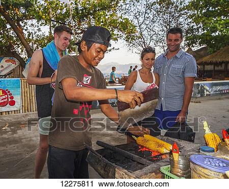Corn on the cob vendor, Gili Trawangan, West Nusa Tenggara, Indonesia View Large Photo Image Stock Image - Corn on the cob vendor, Gili Trawangan, West Nusa Tenggara, Indonesia. Fotosearch