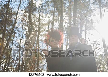 Couple dressed in gothic theme for their engagement portrait; Pittsboro, North Carolina, USA View Large Photo Image Stock Photo - Couple dressed in gothic theme for their engagement portrait; Pittsboro, North Carolina, USA. Fotosearch