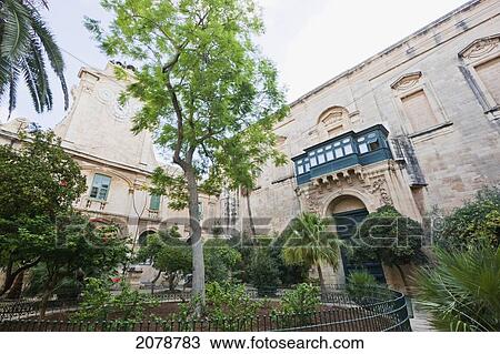 Stock Image - Courtyard Of The Grandmaster's Palace, Home To The House Of Representatives And The Office Of The President Of Malta, Valletta, Malta. Fotosearch