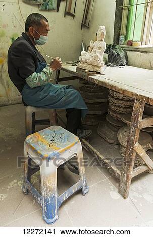 Craftsman at work; Xiamen, Fujian province, China View Large Photo Image Stock Image - Craftsman at work; Xiamen, Fujian province, China. Fotosearch