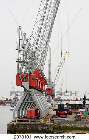 Stock Image - Cranes In The Port Of Rotterdam, Netherlands. Fotosearch