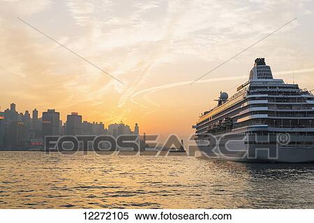 Cruise ship in the harbour at sunset, Kowloon; Hong Kong, China View Large Photo Image Stock Photography - Cruise ship in the harbour at sunset, Kowloon; Hong Kong, China. Fotosearch