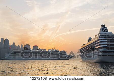 Cruise ships in the harbour at sunset, Kowloon; Hong Kong, China View Large Photo Image Stock Photo - Cruise ships in the harbour at sunset, Kowloon; Hong Kong, China. Fotosearch