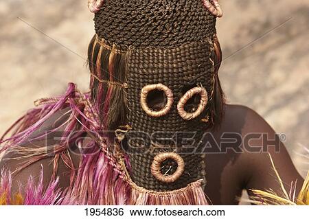 Stock Photograph - Dancer wearing Kananga mask at the Dama celebration in Tireli, Mali. Fotosearch