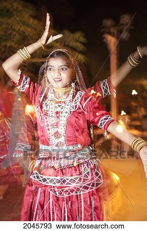 Stock Image - Dancers At Chokhi Dhani Ethnic Village, Jaipur, Rajasthan, India. Fotosearch