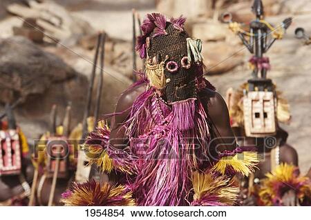 Dancers wearing Kananga masks perform at the Dama celebration in Tireli, Mali View Large Photo Image Picture - Dancers wearing Kananga masks perform at the Dama celebration in Tireli, Mali. Fotosearch