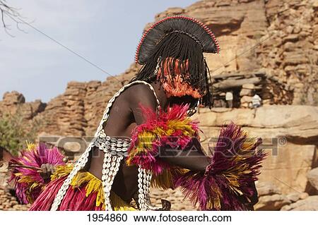 Dancers wearing Kananga masks perform at the Dama celebration in Tireli, Mali View Large Photo Image Stock Image - Dancers wearing Kananga masks perform at the Dama celebration in Tireli, Mali. Fotosearch