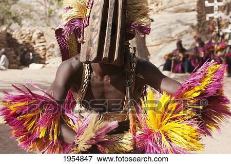 Dancers wearing Kananga masks perform at the Dama celebration in Tireli, Mali View Large Photo Image Stock Photo - Dancers wearing Kananga masks perform at the Dama celebration in Tireli, Mali. Fotosearch