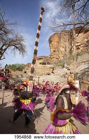 Dancers wearing Kananga masks perform at the Dama celebration in Tireli, Mali View Large Photo Image Stock Photo - Dancers wearing Kananga masks perform at the Dama celebration in Tireli, Mali. Fotosearch