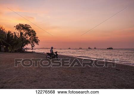 Dili harbour at sunset; Dili, East Timor View Large Photo Image Stock Photo - Dili harbour at sunset; Dili, East Timor. Fotosearch