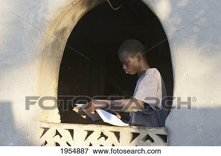 Dogon boy in Sangha, Mali View Large Photo Image Stock Photo - Dogon boy in Sangha, Mali. Fotosearch