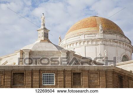 Picture - Dome roof and statues on a cathedral; Conil de la Frontera, Cadiz, Andalusia, Spain. Fotosearch