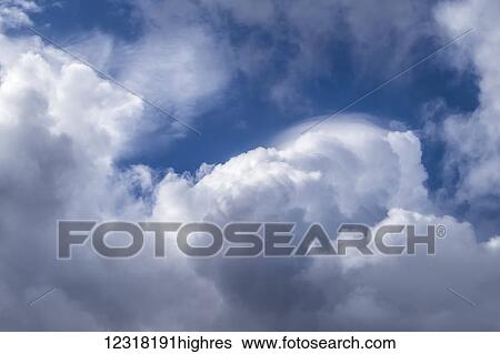 Stock Photograph - Dramatic clouds forming before a storm; London, England. Fotosearch