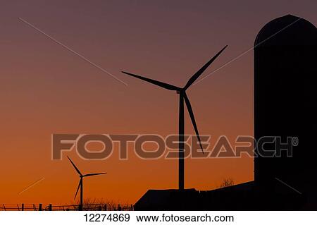 Elk Wind Energy Farm and silo at sunrise, near Edgewood; Iowa, United States of America View Large Photo Image Stock Photo - Elk Wind Energy Farm and silo at sunrise, near Edgewood; Iowa, United States of America. Fotosearch