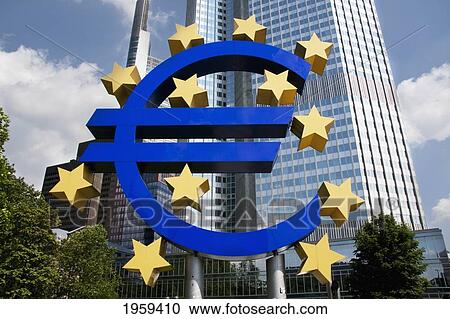 Stock Image - Euro Monument In Front Of The Eurotower, Headquarters Of The European Central Bank In Frankfurt Am Main, Germany. Fotosearch