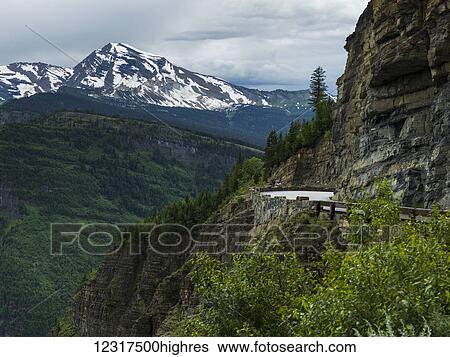 Extreme terrain of rugged mountains and green forested slopes, Glacier National Park; Montana, United States of America View Large Photo Image Stock Photograph - Extreme terrain of rugged mountains and green forested slopes, Glacier National Park; Montana, United States of America. Fotosearch