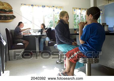 Family Having Lunch In A Diner, Victoria Beach, Manitoba View Large Photo Image Stock Image - Family Having Lunch In A Diner, Victoria Beach, Manitoba. Fotosearch