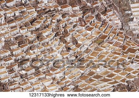 Family owned salt ponds in Sacred Valley near Urubama; Maras, Cusco, Peru View Large Photo Image Stock Photograph - Family owned salt ponds in Sacred Valley near Urubama; Maras, Cusco, Peru. Fotosearch