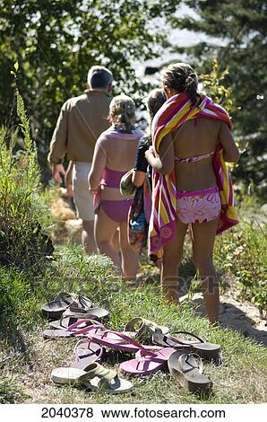 Family Walking Down Path To The Beach, Victoria Beach, Manitoba View Large Photo Image Stock Photo - Family Walking Down Path To The Beach, Victoria Beach, Manitoba. Fotosearch
