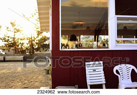 Stock Image - Fast food restaurant on the beach. Fotosearch