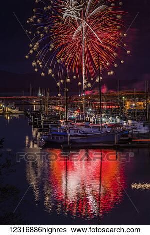 Fireworks light up the harbour; Ilwaco, Washington, United States of America View Large Photo Image Stock Photograph - Fireworks light up the harbour; Ilwaco, Washington, United States of America. Fotosearch