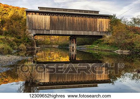 Fisher covered railroad bridge over Lamoille River in autumn; Wolcott, Vermont, United States of America View Large Photo Image Stock Photograph - Fisher covered railroad bridge over Lamoille River in autumn; Wolcott, Vermont, United States of America. Fotosearch