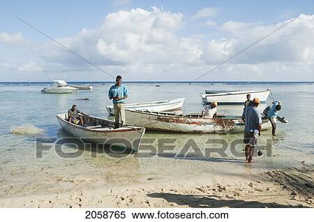 Fishermen Bringing In The Catch, Pointe Aux Piments, Mauritius View Large Photo Image Stock Photography - Fishermen Bringing In The Catch, Pointe Aux Piments, Mauritius. Fotosearch